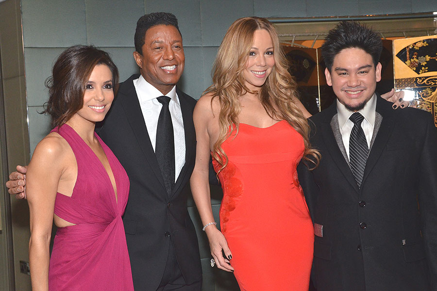 El príncipe Azim con Eva Longoria, Jermaine Jackson y Mariah Carey